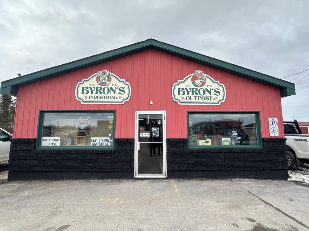Byron’s Industrial and Outpost storefront with the supplied new signs